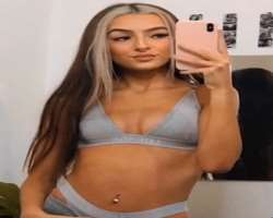 She has a peircing on her belly button alongside  her ears  and nose peircing.
